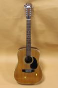 A FENDER MODEL F-55-12 12 STRING ACOUSTIC GUITAR