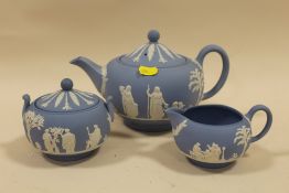 A WEDGWOOD BLUE JASPERWARE THREE PIECE TEA SERVICE