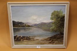 A FRAMED OIL ON BOARD OF A MOUNTAINOUS LAKE SCENE SIGNED R BAYFIELD