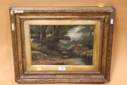 A GILT FRAMED ANTIQUE OIL ON CANVAS DEPICTING A WOODLAND BROOK SCENE,SIGNED LOWER RIGHT