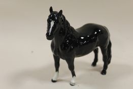 A BLACK AND WHITE BESWICK PONY