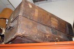 A SMALL VINTAGE LEATHER TRUNK