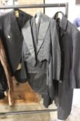 A MILITARY COAT, TWO VINTAGE THREE PIECE SUITS (3)