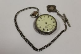 AN ANTIQUE SILVER CASED WALTHAM POCKET WATCH WITH SILVER ALBERT CHAIN AND FOB