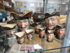 A COLLECTION OF EARLIER FIVE ROYAL DOULTON CHARACTER JUGS - ROBIN HOOD, consisting of one large, two