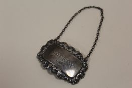 A HALLMARKED SILVER SHERRY DECANTER LABEL