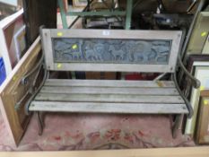 A SMALL CHILD SIZE WOODEN BENCH WITH CAST METAL ANIMAL PANEL TO BACK