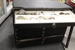 A WATCHMAKERS 9 DRAWER CHEST AND CONTENTS TO INCLUDE WRIST AND POCKET WATCH PARTS