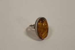 AN WHITE METAL AND AMBER DRESS RING