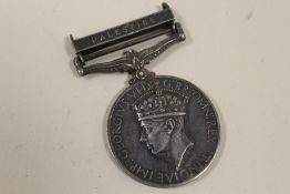 A WHITE METAL PALESTINE MEDAL