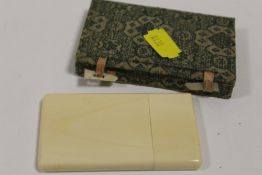 A BOXED CARD CASE