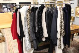 A RAIL OF QUANTITY OF MOSTLY MODERN LADIES COATS AND JACKETS, TO INCLUDE FABBER, BASLER, LEBEK AND