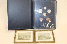 A PAIR OF FRAMED AND GLAZED MINIATURE PRINTS, TOGETHER WITH A COIN SET (3)