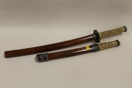 TWO REPRODUCTION SAMURAI STYLE SWORDS
