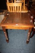 AN OAK BARLEYTWIST DRAW LEAF TABLE