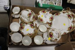A TRAY OF ROYAL ALBERT OLD COUNTRY ROSES CHINA TO INCLUDE A TEAPOT, CUPS AND SAUCERS, CAKE STAND