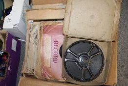 A BOX OF VINTAGE RECORDS, TOGETHER WITH A VINTAGE FILM REEL