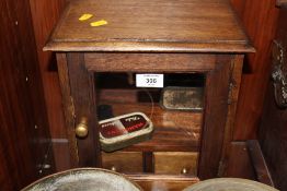 A VINTAGE OAK SMOKERS CABINET