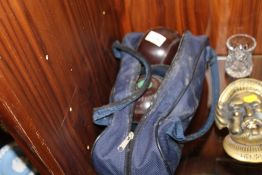 A BAG OF VINTAGE LAWN BOWLS