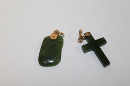 TWO 9 CARAT ROSE GOLD MOUNTED JADE PENDANTS TO INCLUDE A CROSS