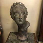 A LATE 19TH / EARLY 20TH CENTURY PATINATED PLASTER LIBRARY BUST (AFTER AN ANTIQUE CLASSICAL MARBLE