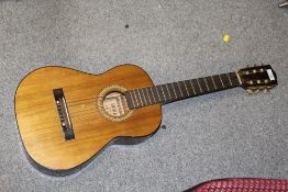 A VINTAGE HOKADA CHILD SIZE ACOUSTIC GUITAR A/F