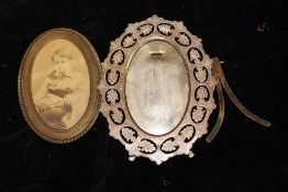 TWO VICTORIAN BRASS PICTURE FRAMES BOTH MARK 'MARION LONDON'