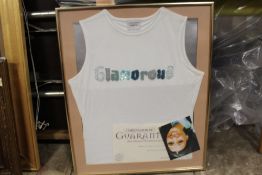 A FRAMED AND GLAZED VEST TOP WORN BY SURANNE JONES FROM CORONATION STREET (KAREN MCDONALD) WITH
