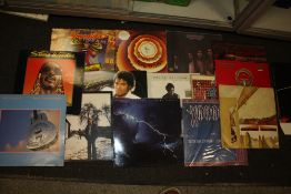 A COLLECTION OF LP RECORDS ETC. TO INCLUDE TOTO, TALKING HEADS, TRACY CHAPMAN ETC. TOGETHER WITH