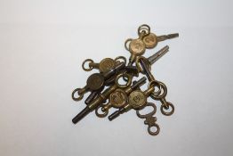 A BAG OF ANTIQUE WATCH KEYS