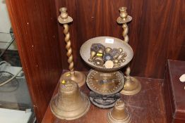 A LARGE VINTAGE BRASS BELL, TOGETHER WITH ANOTHER, BRASS BARLEY TWIST CANDLESTICKS AND A SET OF