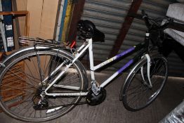 A PURPLE AND WHITE PIONEER SPRINT BICYCLE