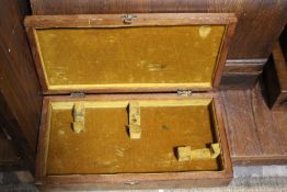 A VINTAGE WOODEN PISTOL CASE