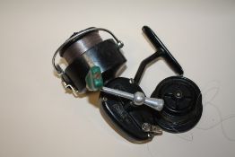 A VINTAGE MITCHELL 350 FISHING REEL WITH SPARE SPOOL
