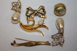 A PAIR OF SWAROVSKI CRYSTAL CLIP ON EARRINGS, TOGETHER WITH BROOCHES AND A ROTARY PENDANT WATCH