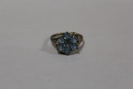 A 9 CARAT GOLD BLUE TOPAZ SET DRESS RING SIZE P APPROX WEIGHT - 2.5G
