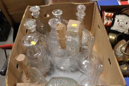 A BOX OF GLASS DECANTERS ETC.