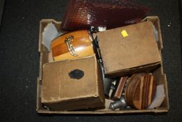 A TRAY OF COLLECTABLES TO INCLUDE AN INDIAN WOODEN TRAVELLING CHESS SET, BOXED GAS MASKS, PIN BADGES