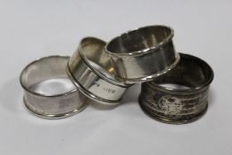FIVE SILVER NAPKIN RINGS TO INCLUDE A CHARLES HORNER EXAMPLE