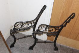 TWO BLACK METAL BENCH ENDS