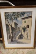 A FRAMED AND GLAZED WATERCOLOUR OF A CONTINENTAL STREET SCENE INDISTINCTLY SIGNED LOWER RIGHT