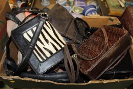 A TRAY OF LADIES LEATHER AND OTHER HANDBAGS ETC.