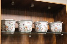 A SET OF FOUR ORIENTAL STYLE CERAMIC JARDINAIRES