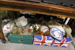 THREE TRAYS OF ASSORTED GLASSWARE AND CERAMICS TO INCLUDE RETRO LIGHT SHADES, WEDGWOOD ETC.