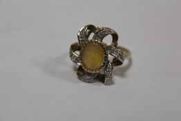 A HALLMARKED 9 CARAT GOLD DRESS RING SET WITH A CITRINE SIZE N APPROX WEIGHT - 4.8G