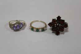 THREE GEM SET SILVER DRESS RINGS