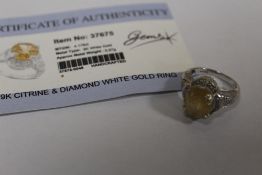 A 9K WHITE GOLD AND CITRINE DRESS RING WITH CERTIFICATE, SIZE- N APPROX WEIGHT - 6.8G
