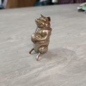 A NOVELTY FREESTANDING GO TO BE VESTA CASE IN THE FORM OF A PIG