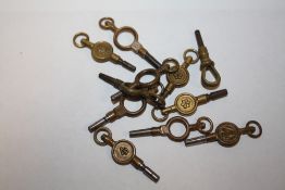 A BAG OF ANTIQUE WATCH KEYS