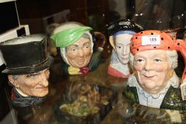 FOUR LARGE ROYAL DOULTON CHARACTER JUGS TO INCLUDE 'THE FORTUNE TELLER' AND 'ANNE OF CLEAVES'